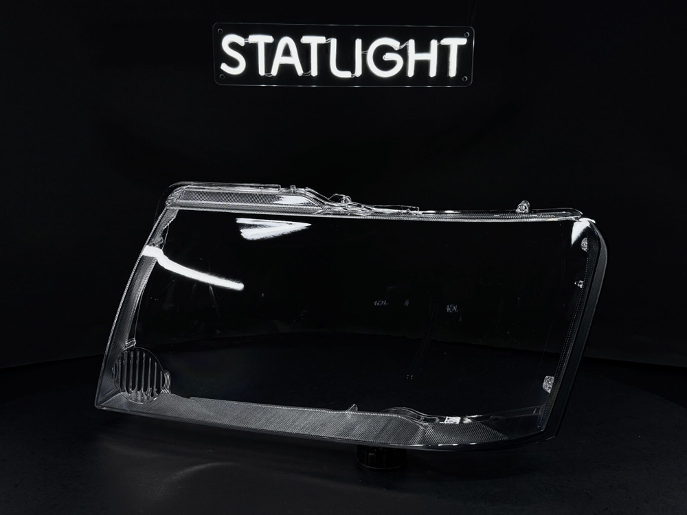 Левое стекло фары Nissan Patrol Y61 2004-2024 рест