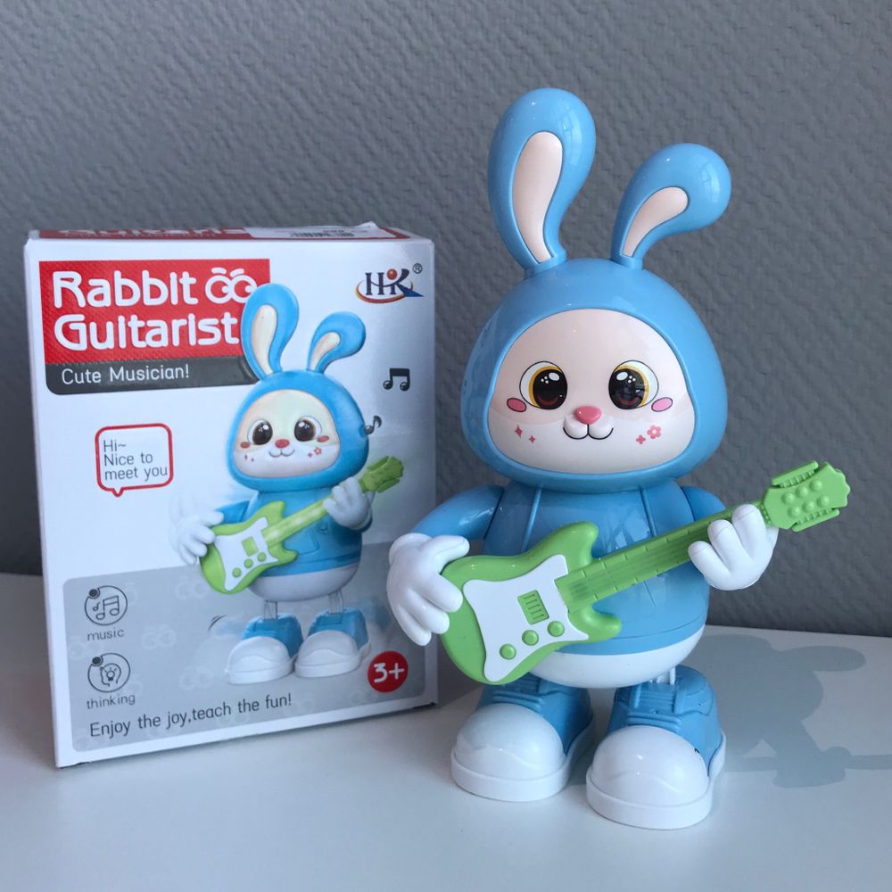 Зайчик игрушка на батарейках с гитарой голубой &quot;rabbit guitarist&quot; 665В