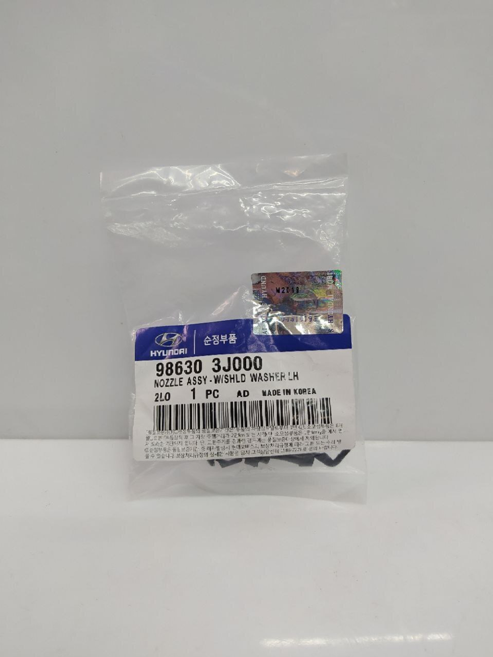 Форсунка стеклоомывателя веерная (1шт.) HYUNDAI/KIA 986303J000