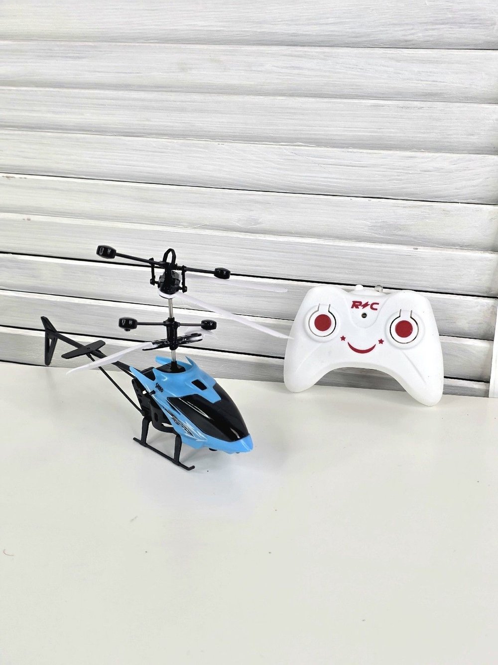 Игрушка Вертолет на радиоуправлении голубой (202388896-1)