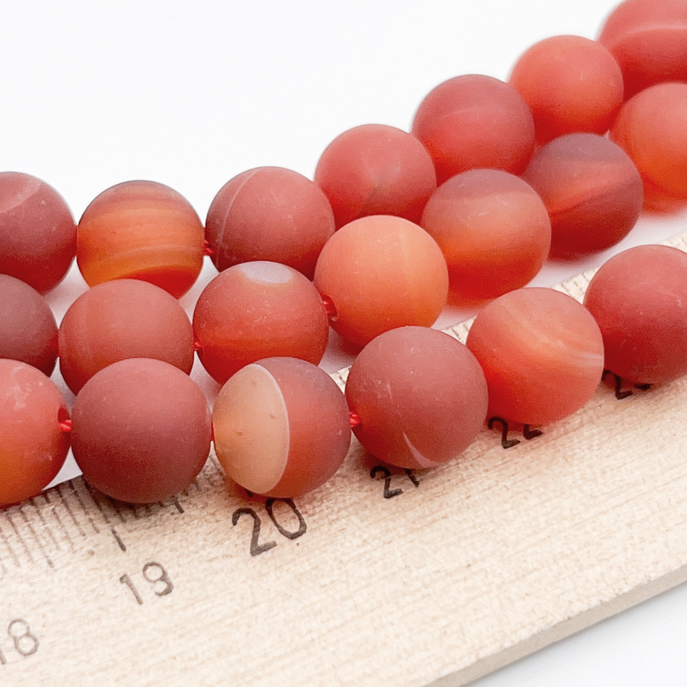 Агат матовый бусины, тонированный под сердолик, диаметр около 10-10,2 мм, цена за 18-19 шт (1/2 нити)