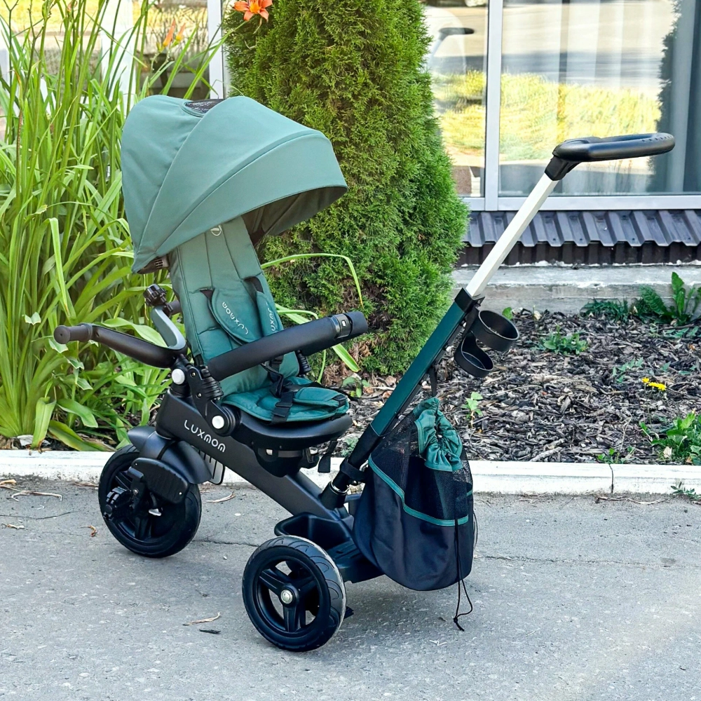 Трехколесный велосипед Luxmom 3001 (с поворотным сиденьем, зеленый)