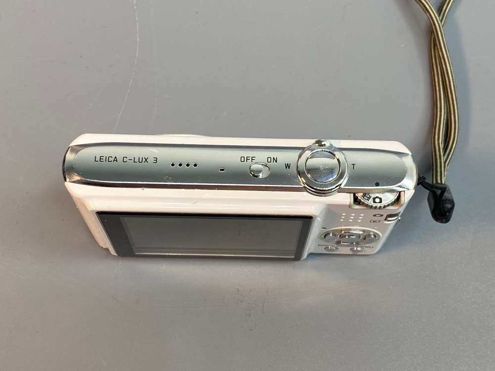 Leica C-Lux 3 на длинном зуме виднеется пылинка