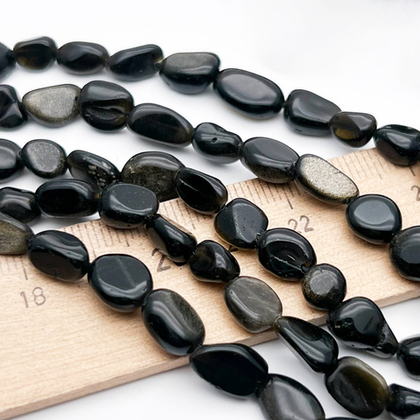 Обсидиан "Золотой" бусины, галтовка, размер около 6-10 мм, цена за нить 38 см