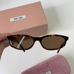 Солнцезащитные очки MIU MIU