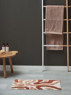 Коврик для ванной Flow терракотового цвета из коллекции Ethnic, 50x80 см