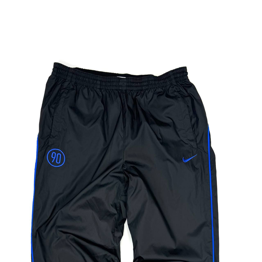 Брюки Nike T90