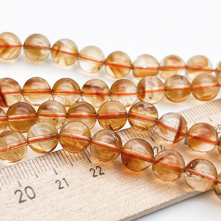 "Цитрин" бусины (кварц), диаметр около 8,4-8,6 мм, цена за 11 шт (1/4 нити)