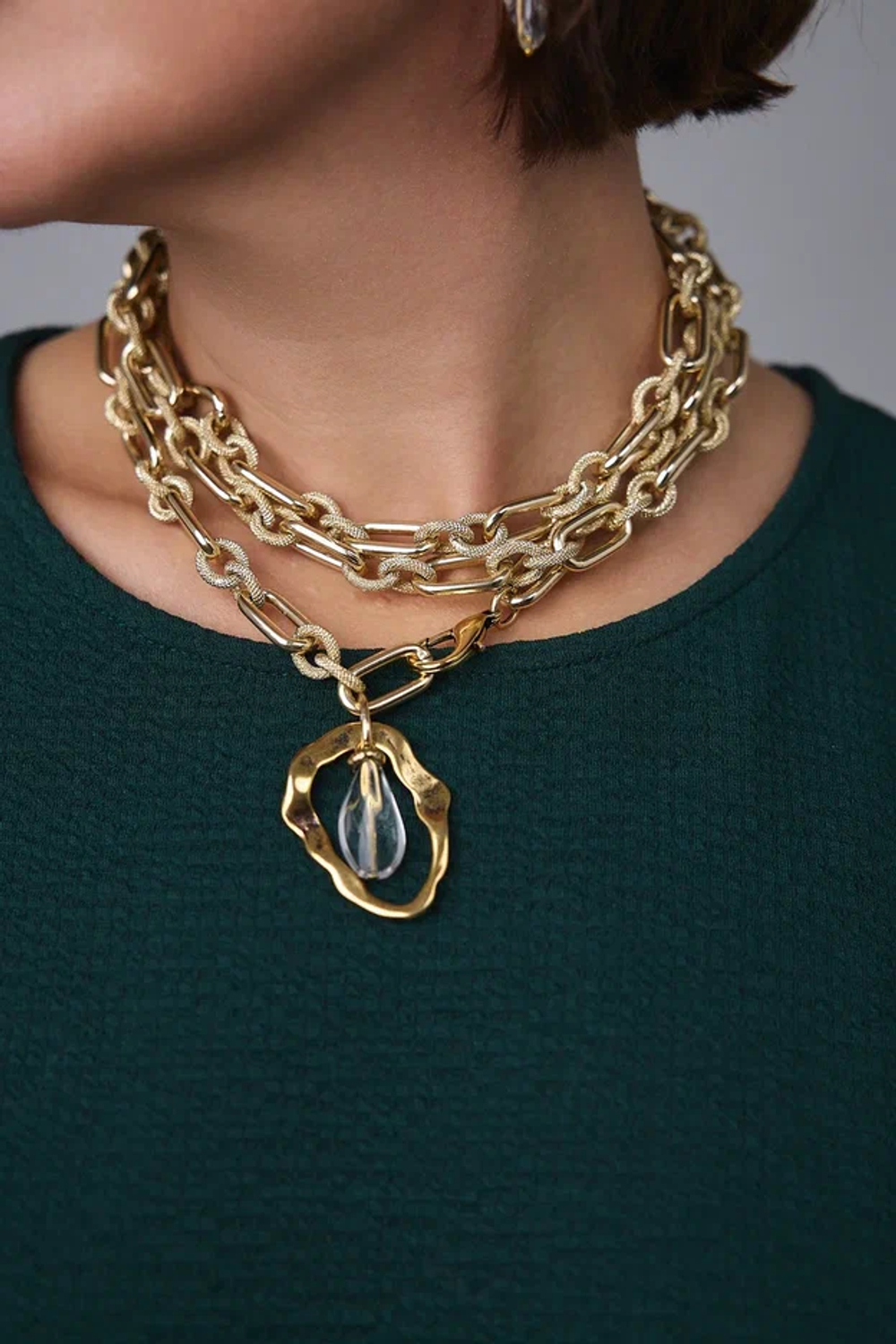 Цепь-трансформер длинная: овальные и рифленые золотые кольца, с горным хрусталем