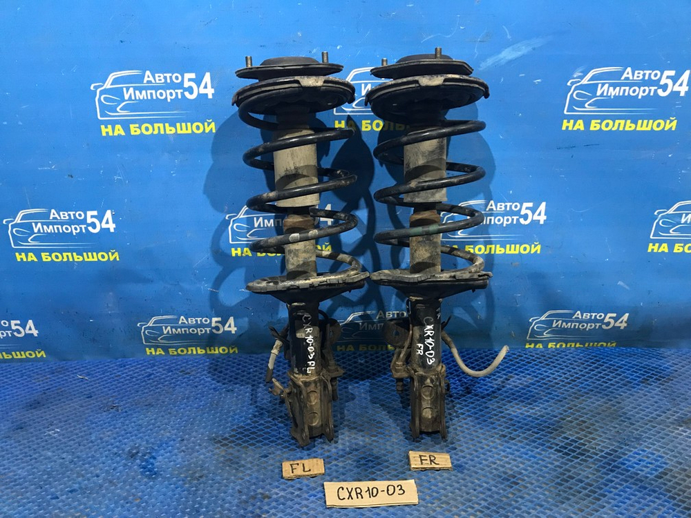 Стойка передняя левая TOYOTA ESTIMA 1998