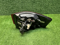 Фонарь левый внешний Toyota Land Cruiser 300 21-нв