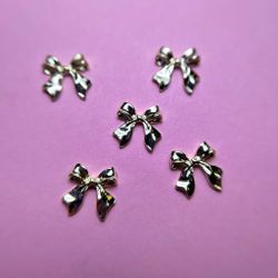 1854 Фигурки объёмные "Бантики" металл 5 шт