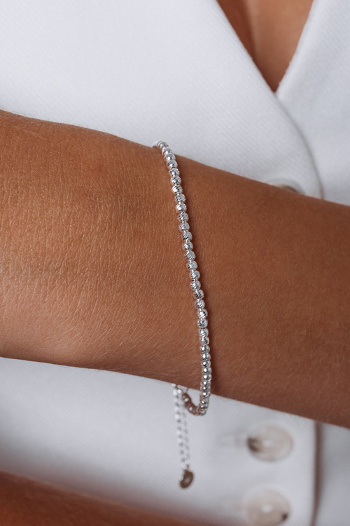 Браслет "QUIET LUXURY" из мелких шариков с алмазными гранями