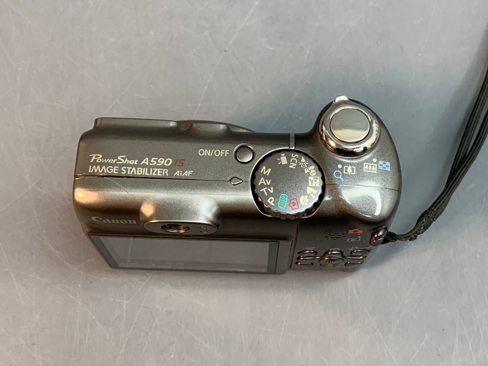 Canon PowerShot A590 IS колесо режимов свободно вращается