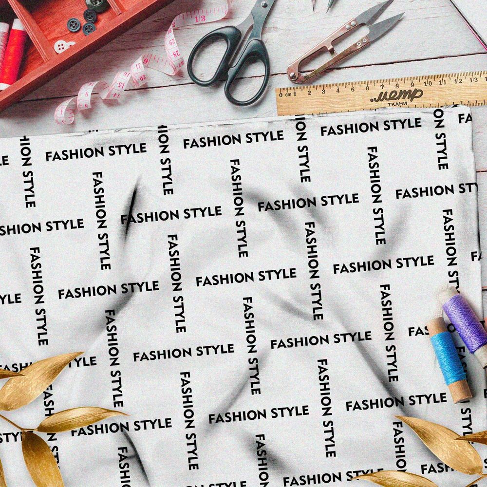 Ткань бифлекс стильная клетка из чёрных надписей на бежевом фоне