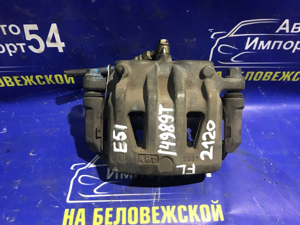 Суппорт тормозной передний левый NISSAN ELGRAND 2004