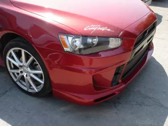 Бампер передний EXTREME для Mitsubishi Lancer 10