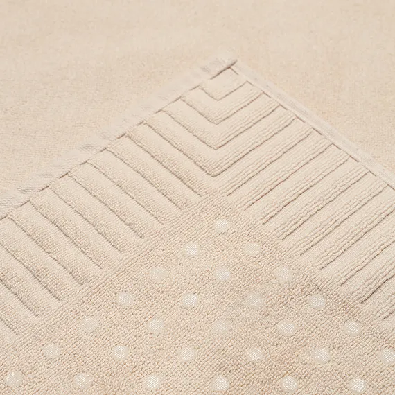 Коврик для ванной с фактурным бортиком кремового цвета из коллекции essential, 50x80 см