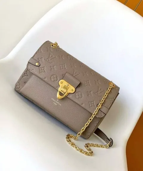 Сумка Louis Vuitton Vavin PM бежевый