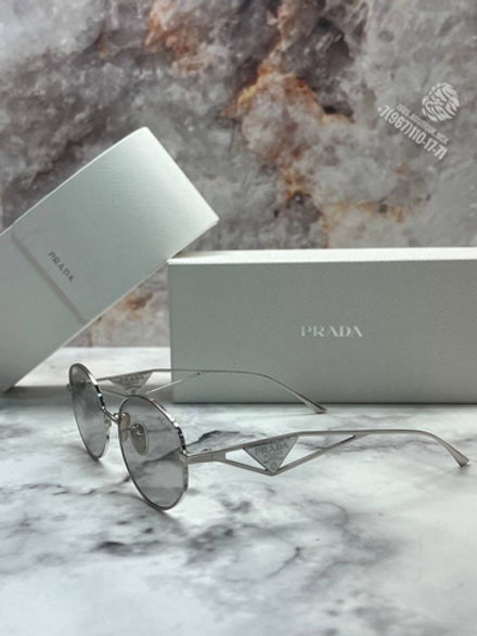 Солнечные очки Prada