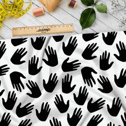 Ткань блэкаут чёрные ладони на белом фоне