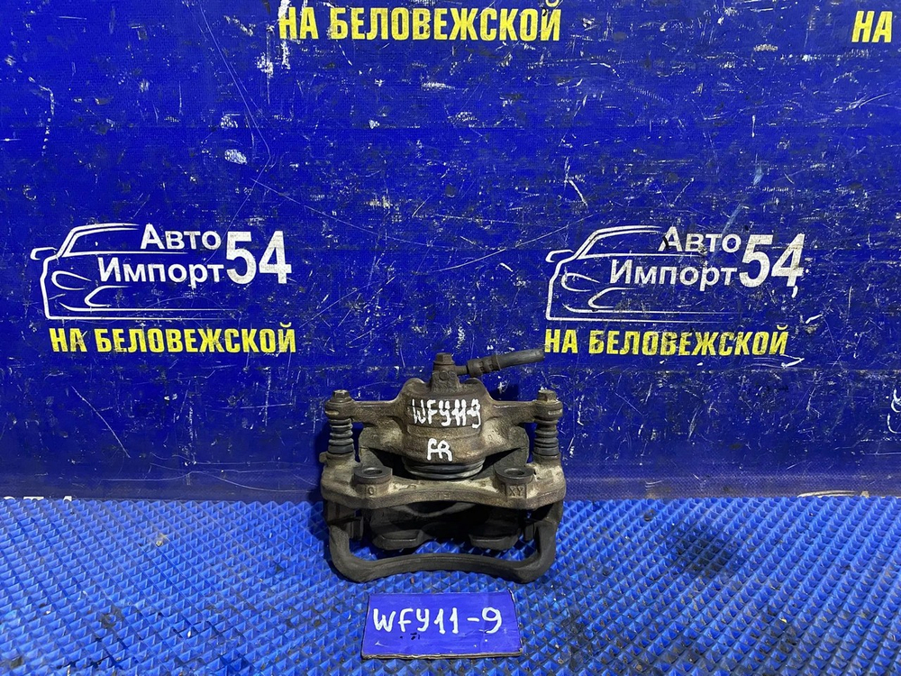 Суппорт тормозной передний правый NISSAN WINGROAD 2000