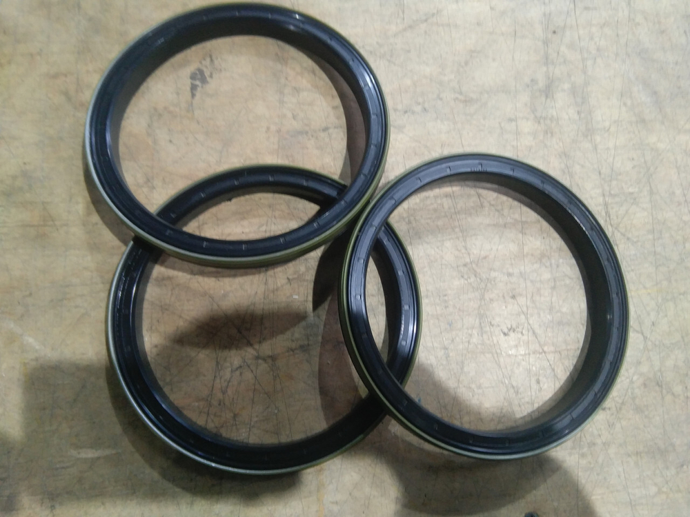 Сальник ступицы CAT 428D CA1306879, 130-6879