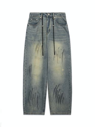 Широкие джинсы на кулиске с пятнами