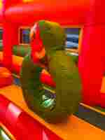 Коммерческий надувной батут «Страна Сафария 2» с крышей и двумя горками, 12*6*6 м