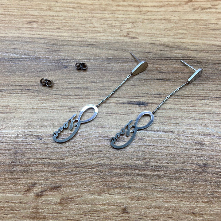 Серьги-гвоздики капля перевернутая жгутики Бесконечность Love цвет серебристый