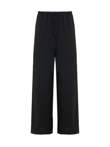 Прямые широкие черные брюки на кулиске