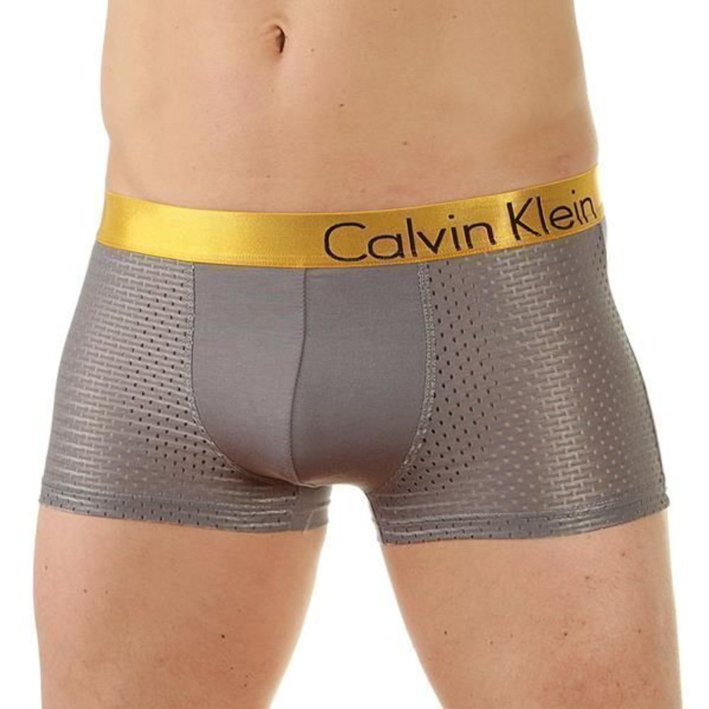 Мужские трусы боксеры светло-серые с золотистой резинкой Calvin Klein Bold Boxer со вставкой