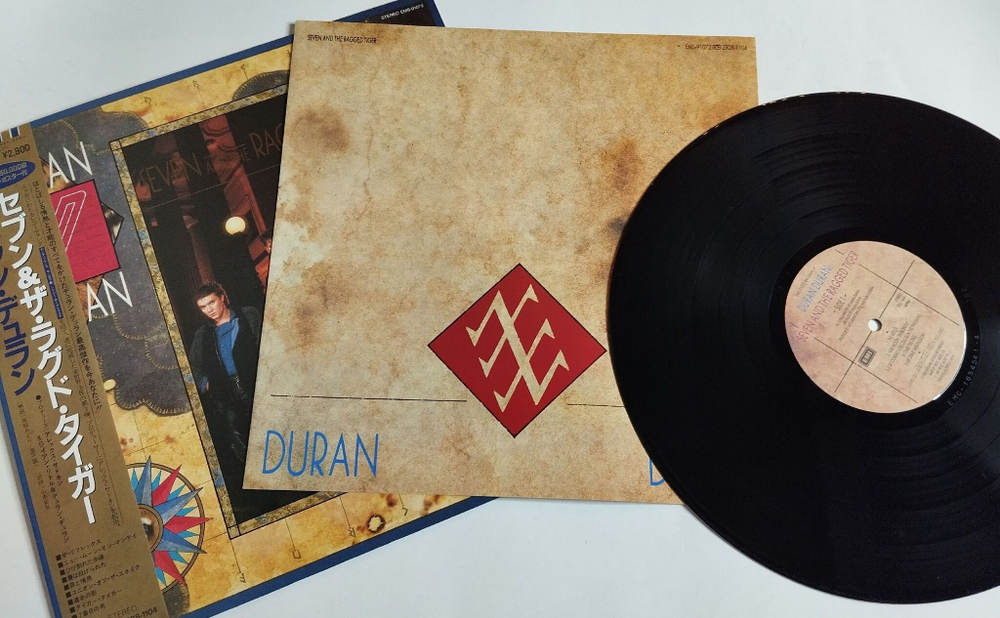 Винтажная виниловая пластинка LP Duran Duran Seven And The Ragged Tiger (Japan 1983) (Obi) NM