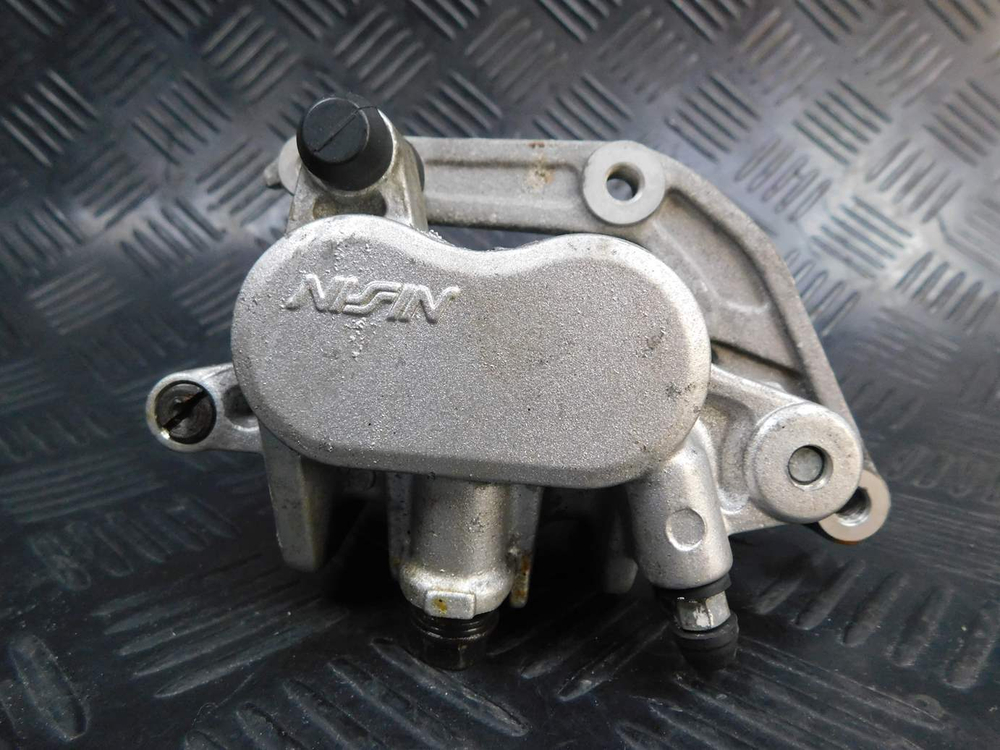 Суппорт тормозной передний Honda Shadow 400 NC34 052561