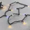 Светодиодная гирлянда с колпачком 75 теплых белых LED ламп 10 м., мерцание, 24В., черный каучуковый провод, IP65, LTC (LL75BLW-1-1WW)