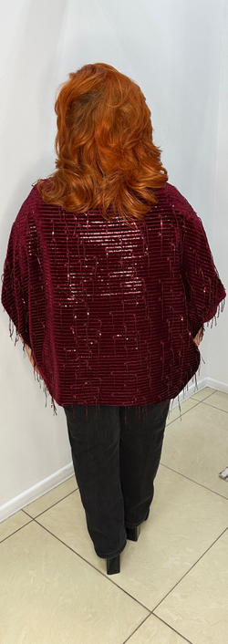 Нарядный блузон-туника с блестящими пайетками