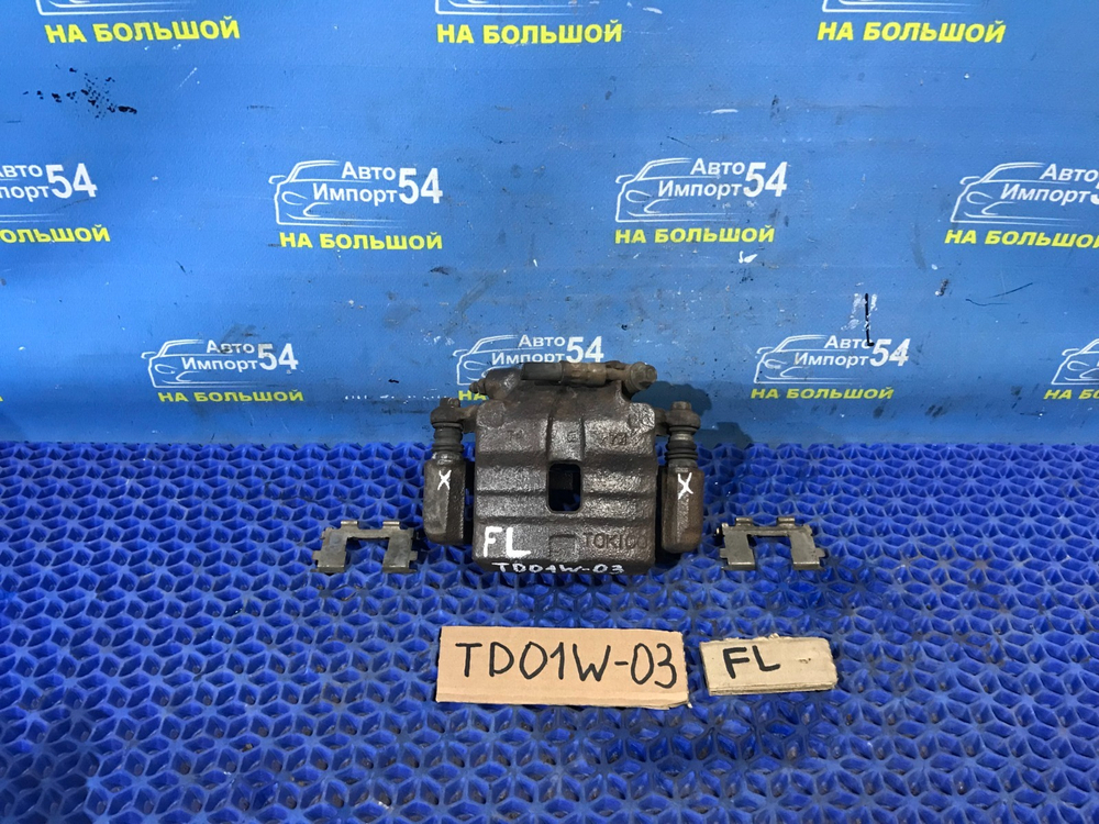 Суппорт тормозной передний левый SUZUKI ESCUDO 1995