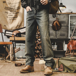 Джинсы мужские прямые потертые от марки JIELEINUO сезон весна-осень