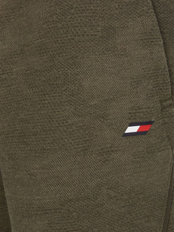 Мужские теннисные штаны Tommy Hilfiger Comfort Capsule Pant - зеленый