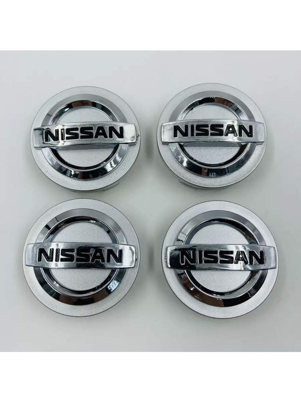 Колпачки заглушки на литые диски с эмблемой Nissan 59 мм 4 шт