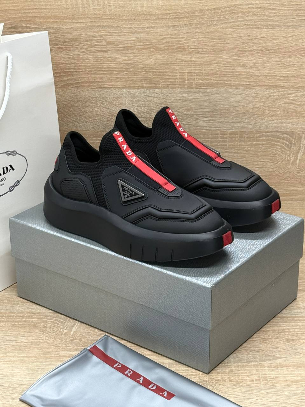 Кроссовки Prada