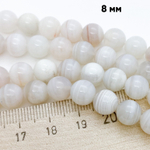 Агат белый, диаметр 8,4-8,6 мм, цена за 11 шт (1/4 нити)