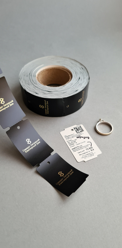 Печать золотым на черных бирках