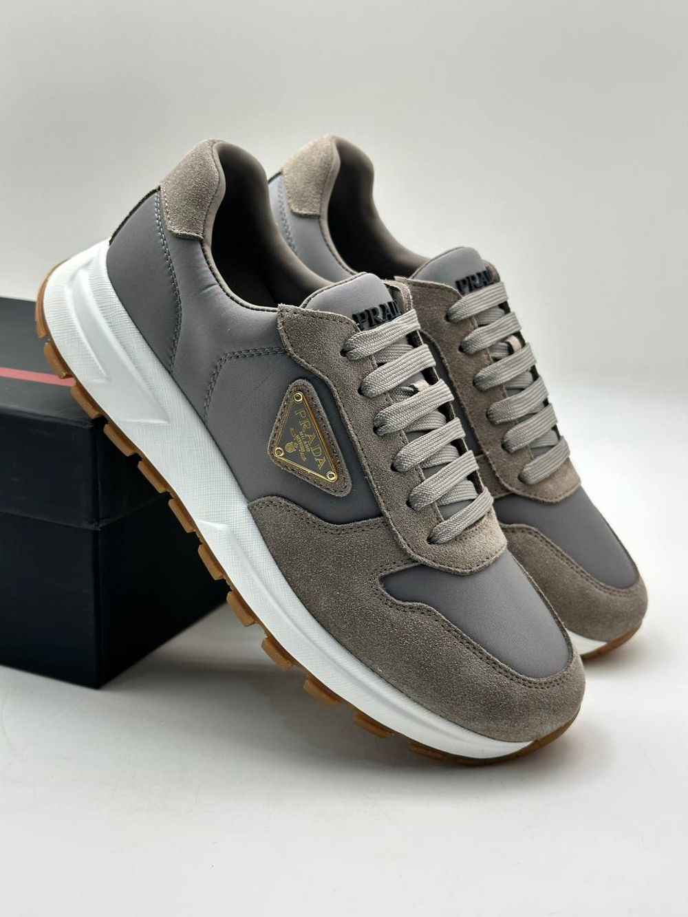 Кроссовки Prada