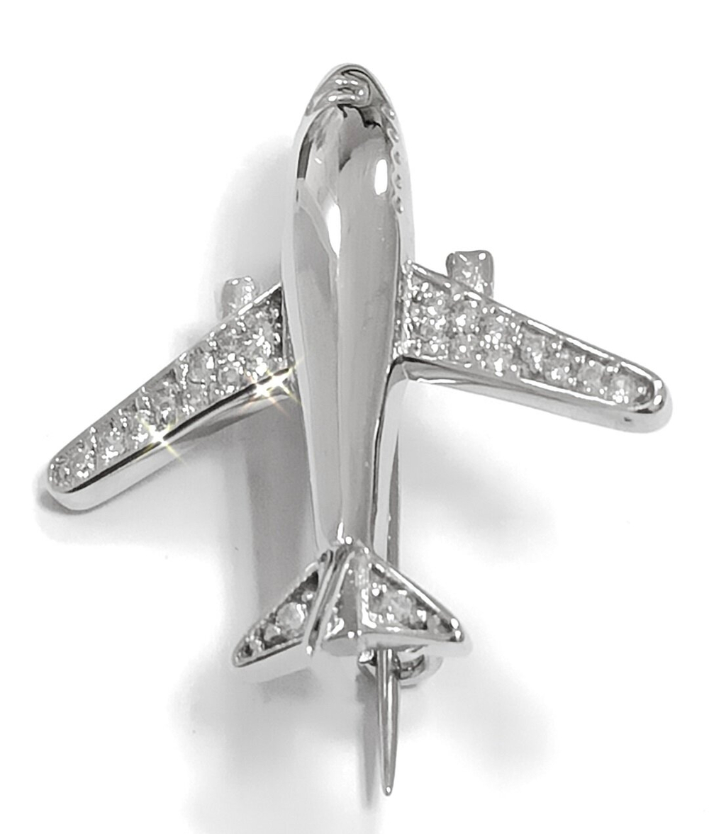 Ювелирная брошь из серебра "Самолет" с фианитами