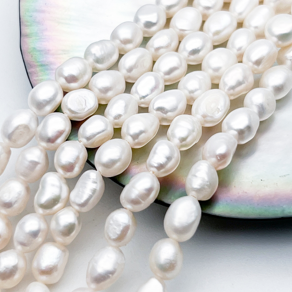 Жемчуг, размер около 6,5-7 мм, цена за отрезок 17 см (1/2 нити)