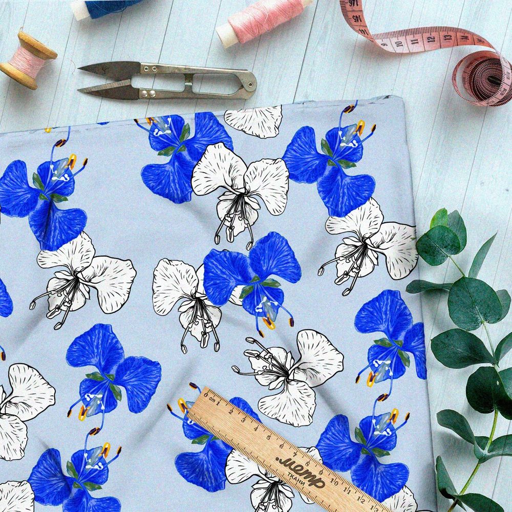 Ткань шелк Армани белые и синие орхидеи на голубом фоне