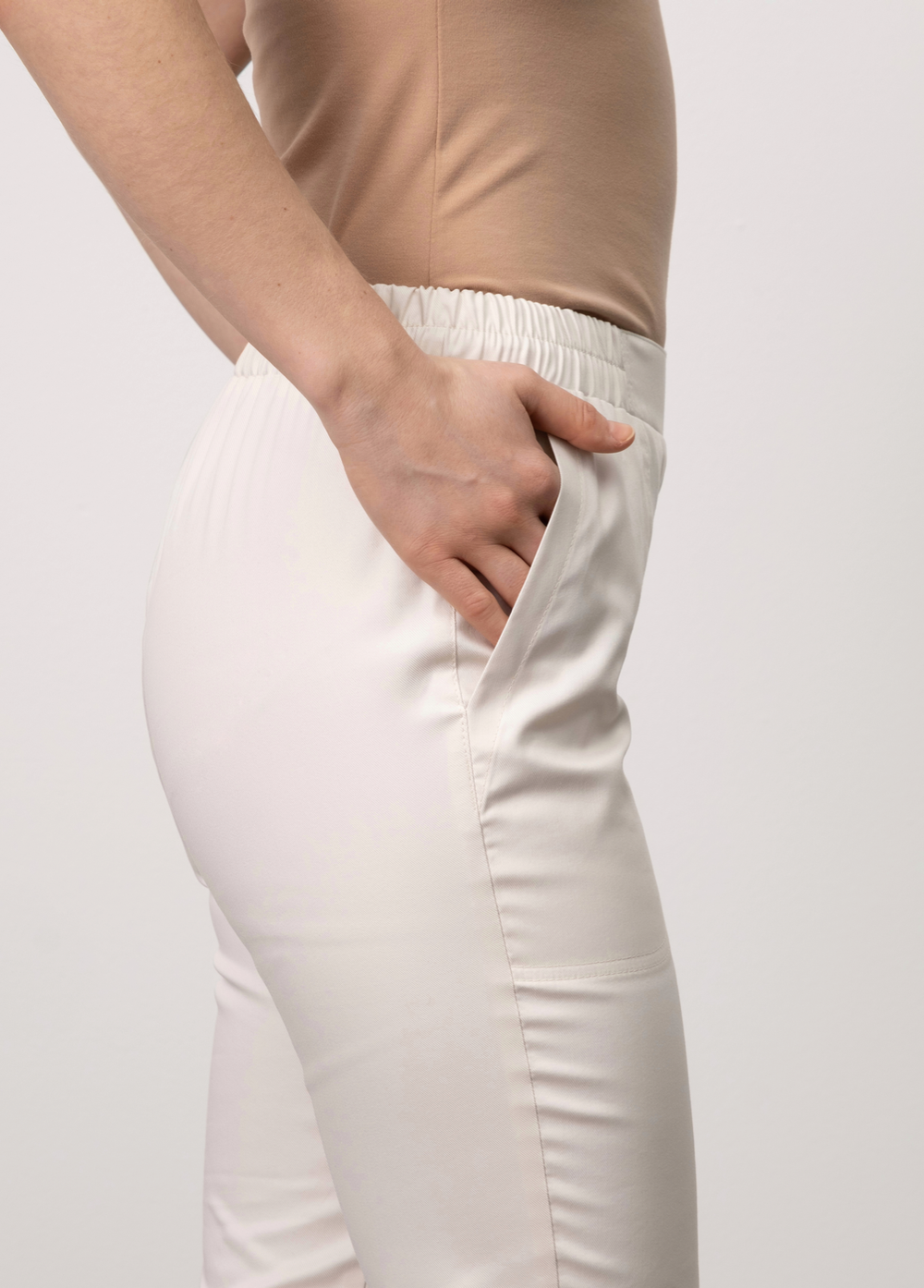 Брюки с защипами