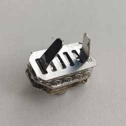 Замок вертушка на винтах 27*17 Серебро