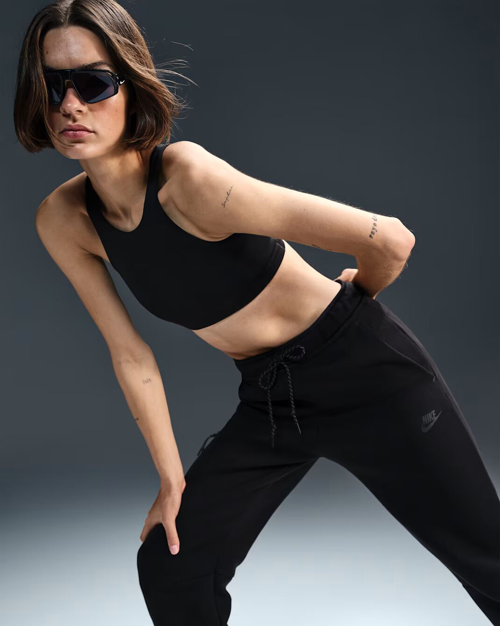 Nike Sportswear Tech Fleece Женские джоггеры с нормальной посадкой - NIKE